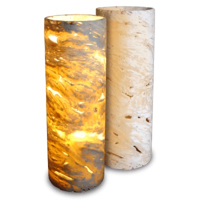 two cylindrical onyx floor lamps standing next to each other from picado collection with yellow, orange, and gray betas