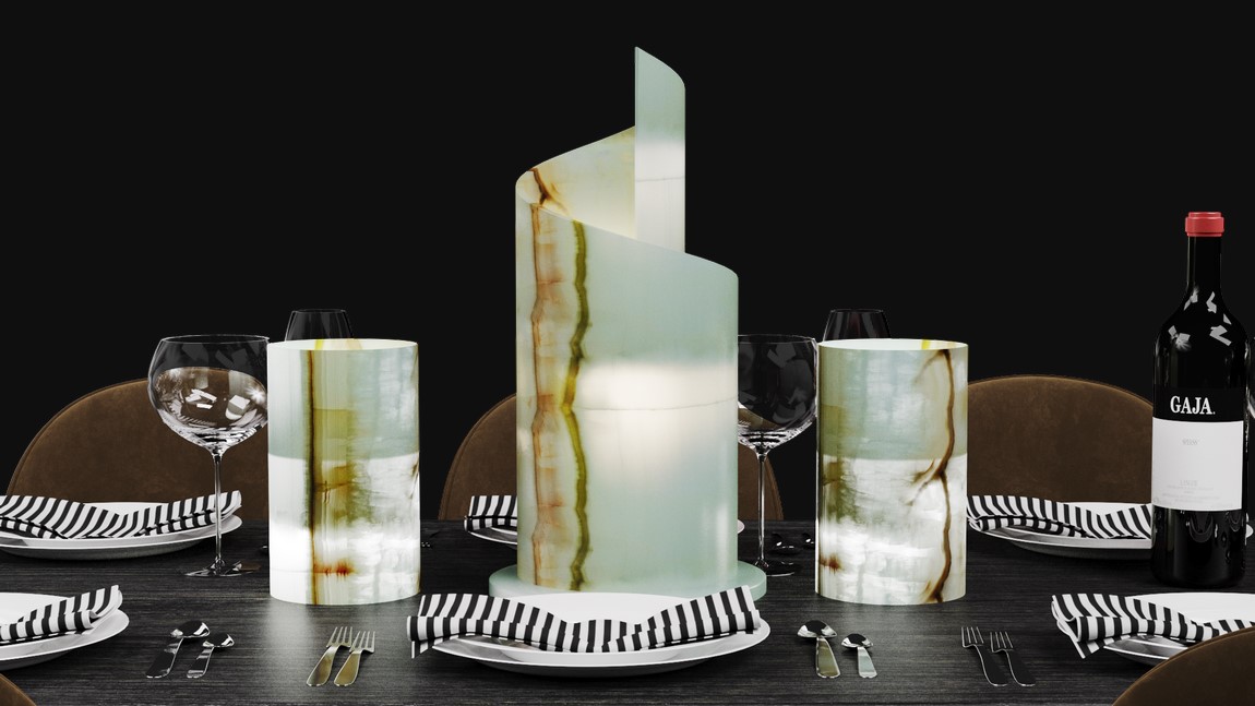 Three small-sized onyx table lamps made from Verde Talan stone collection standing on the dinner table